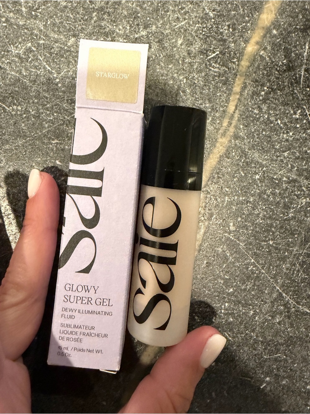 Saie Glowy Super Gel Dewy Illuminator - Starglow (Light Beige)